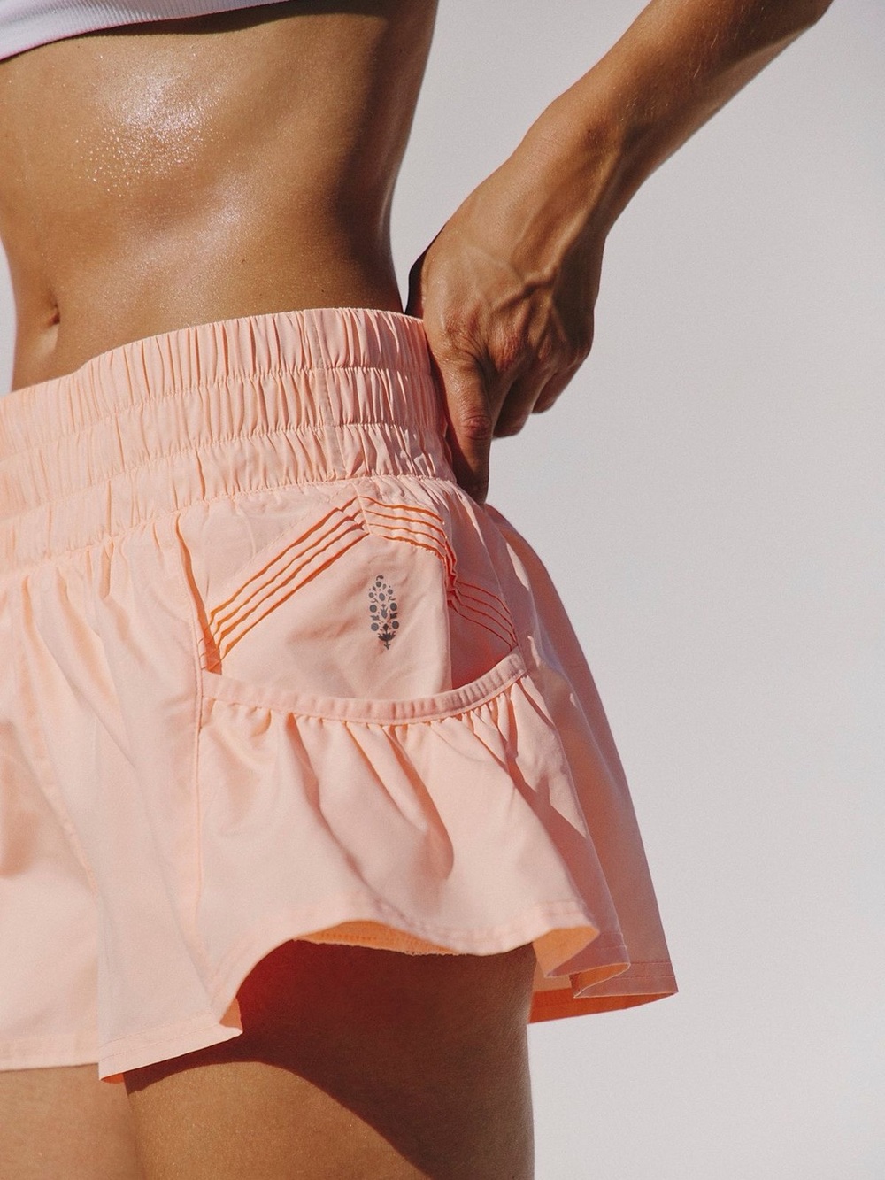 FP Movement Get Your Flirt On Shorts NWT Size M Free People Pastel Peach Orange